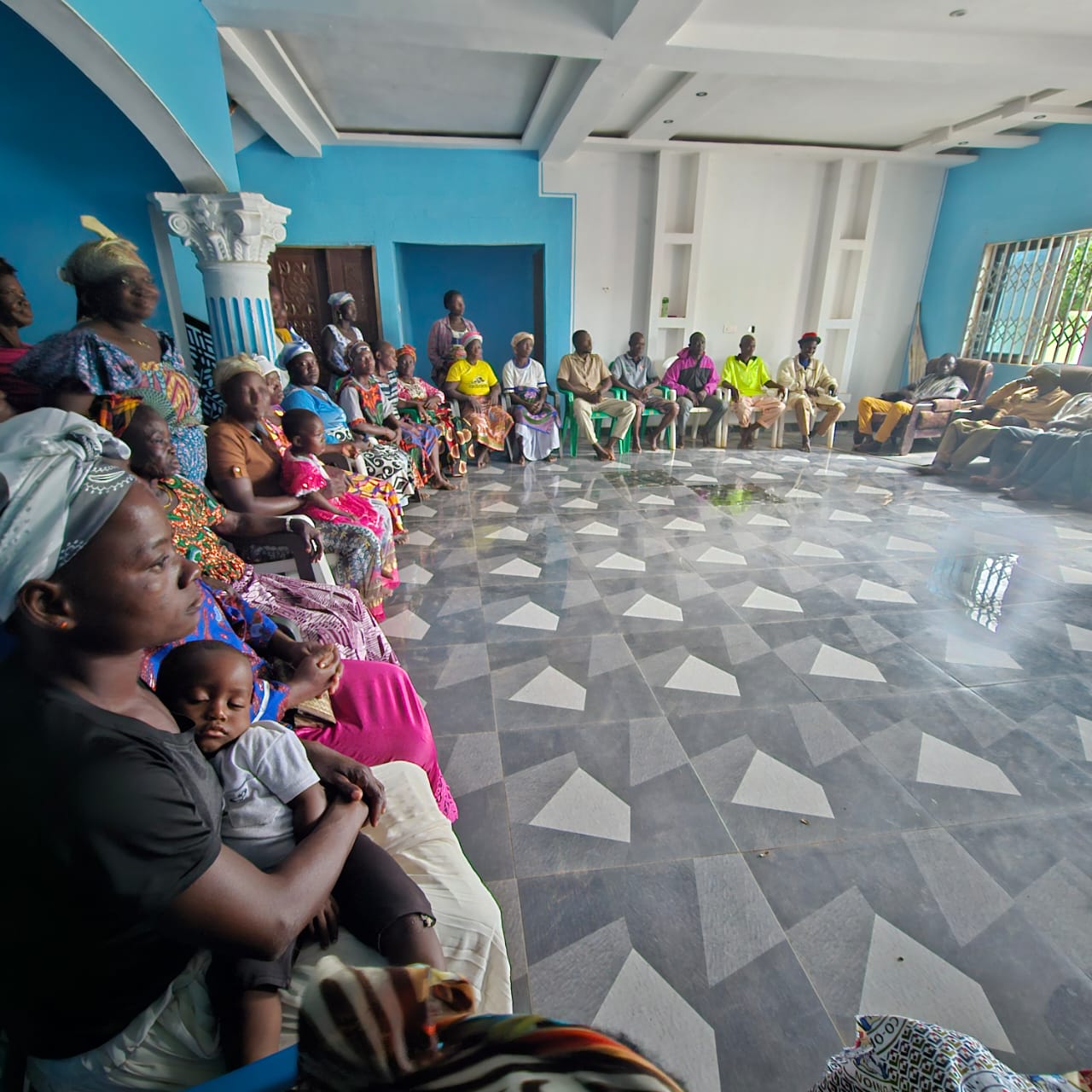Margliz Foundation at a full community assembly meeting