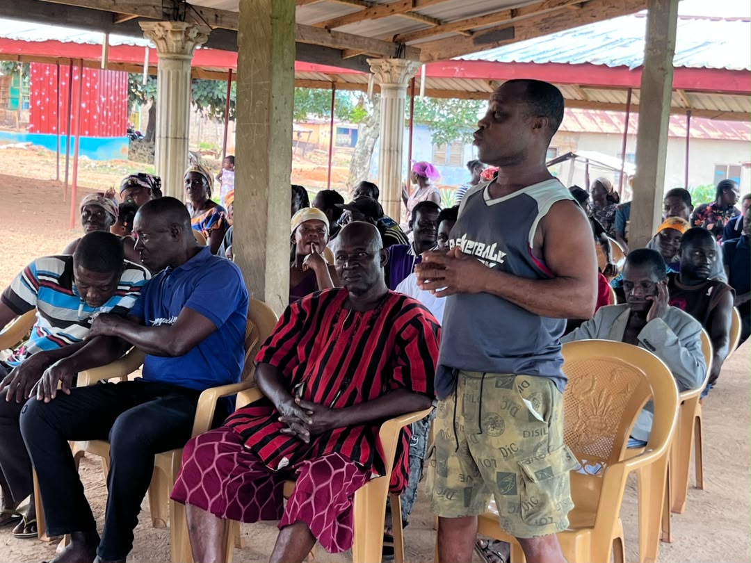Margliz Foundation team with community elders and residents