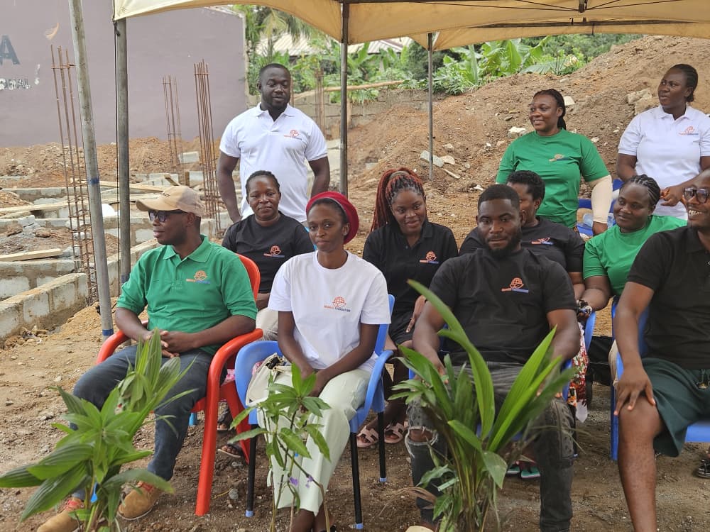 Margliz Foundation team distributing tree seedlings to community members
